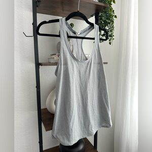 Women’s Under Armour, light‎ weight, running tank, size medium.